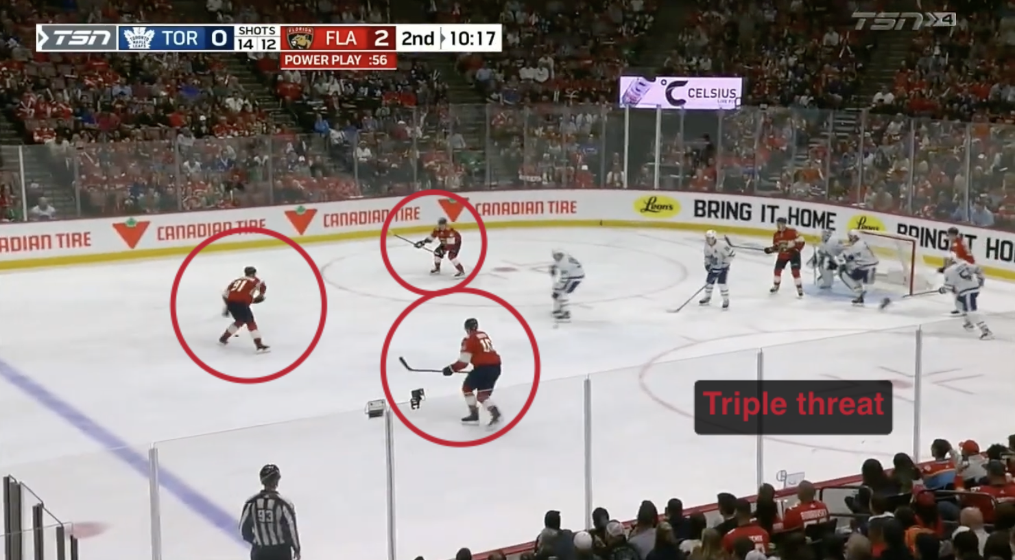 Paused game frame with a coach's arrow and circle drawn on the play
