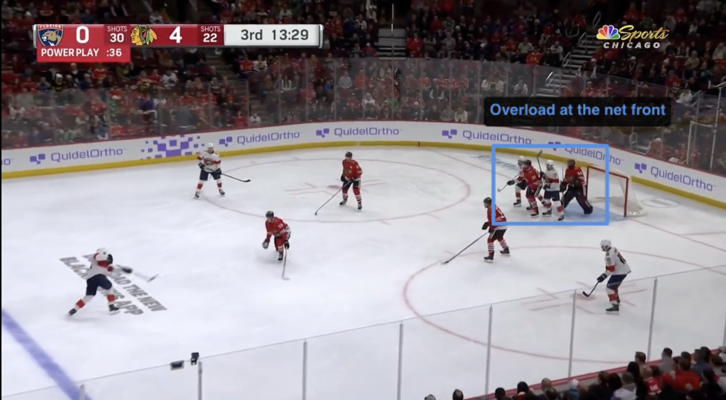 Paused game frame with a coach's arrow and circle drawn on the play