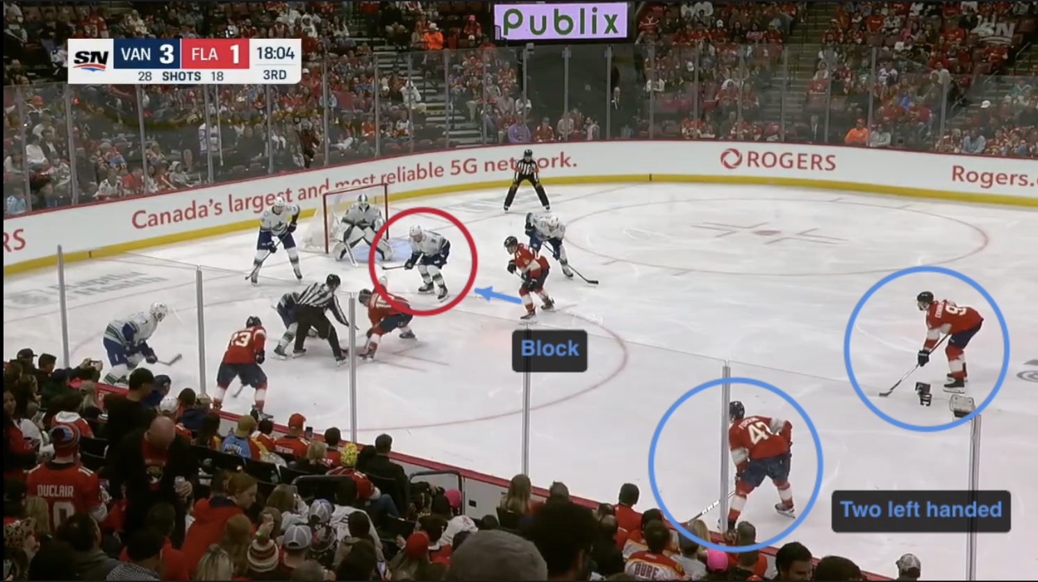 Paused game frame with a coach's arrow and circle drawn on the play
